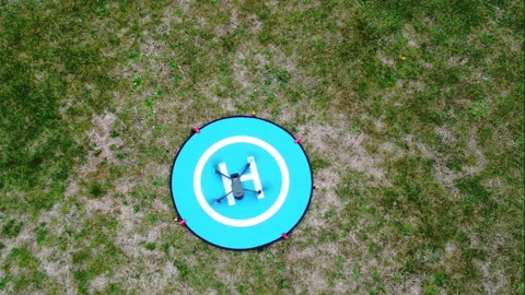 Drone take off from landing pad Stock Footage 171812033
