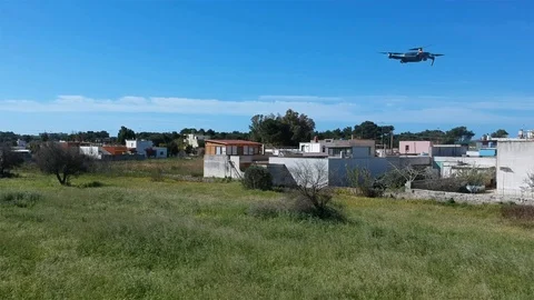 Drone take off over a green field Stock Footage 88259959