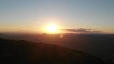 Drone take with sunset on top of the mountain Stock Footage 153373495