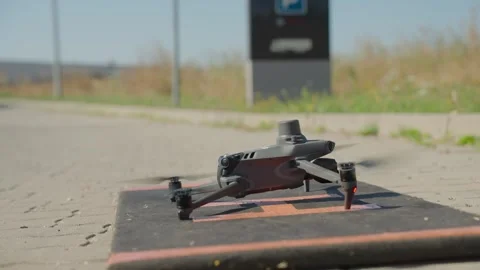 Drone Takeoff Close Up UAV Launching into Sky with Spinning Propellers and Stock Footage 331095147
