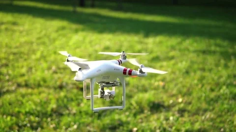 Drone takeoff in park Stock Footage 84576163