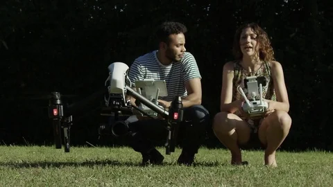 Drone Takeoff Super Slow Motion With Two Young Attractive Hip Pilots In The Stock Footage 82593134