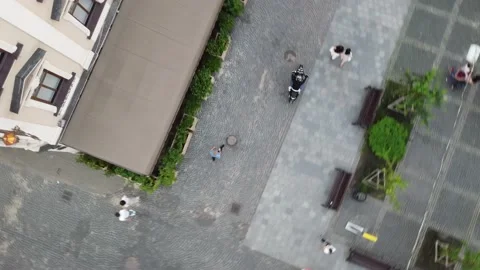 Drone takes off the busy intersection in Vietnam from top to down with a view of Stock Footage 142897752