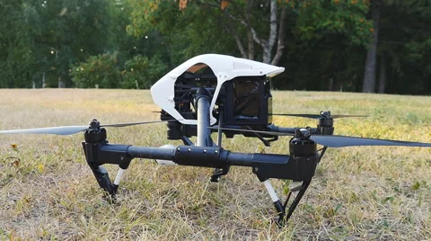 Drone takes off from the grass Stock Footage 65881923