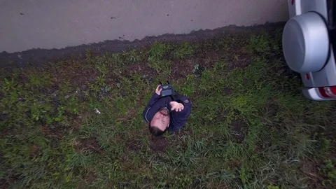 Drone takes off from the hands. Man on earth with a remote control. aerial to 스톡 동영상 107790965