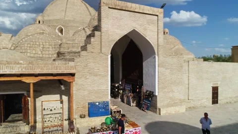 The drone takes a panorama of the oriental bazaar next to the Chor Minor, the Stock Footage 255424768