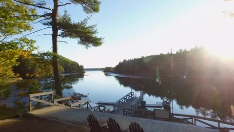 Drone taking off from dock on lake 스톡 동영상 120139004