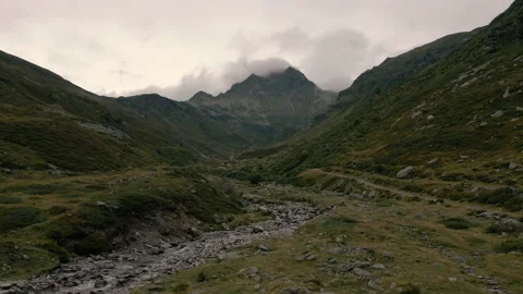 Drone taking off in front of Spadolazzo peak in Madesimo Stock-Footage 251543316