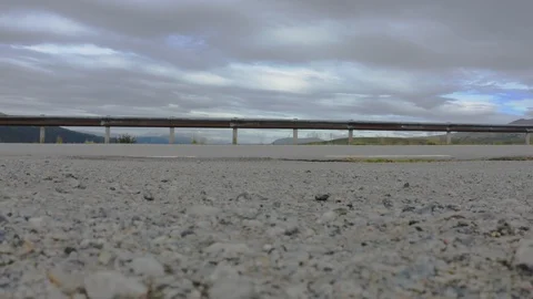 Drone Taking off from the ground, a Motorcycle rides from the front Video stock 115632536