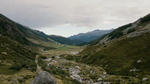 Drone taking off in Madesimo valley mountain meadows Stock Footage 251569032