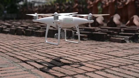 Drone Taking Off in Park with Terracotta Statues: Technology and Innovation.. Stock Footage 299799714