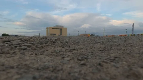 Drone taking off from urban development site under construction Stock Footage 114711973