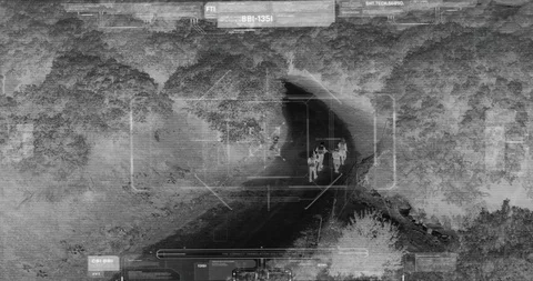 Drone with thermal night vision view of terrorist squad walking with weapons Vidéo 106681388