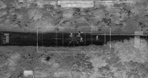 Drone with thermal night vision view of terrorist squad walking with weapons Video stock 106681655
