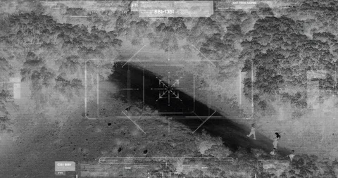 Drone with thermal night vision view of terrorists with camera zooming in Video stock 106682177