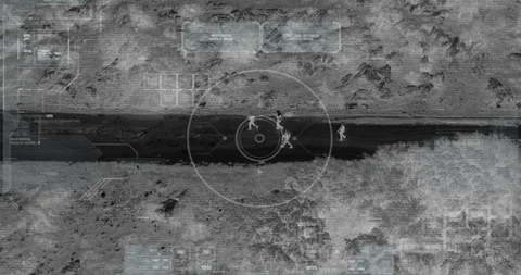 Drone with thermal night vision view of terrorists with camera zooming in Vidéo 106682253