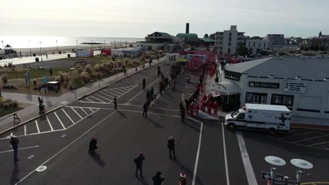 Drone a thousand Santas head out from start Video stock 170576987