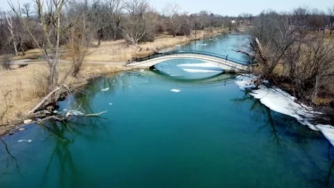 Drone Through Bridge w/ Bird Flying - Late Winter (color graded) 스톡 동영상 172106291