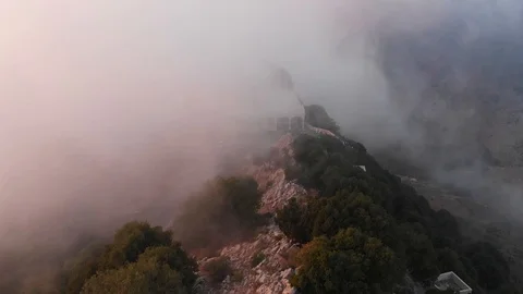 Drone through clouds of middle eastern temple Vidéo 96186345