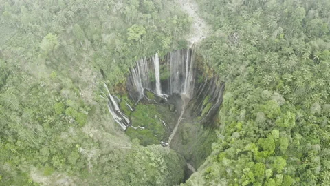 Drone Through Mist Over Tumpak Sewu Waterfalls Stock Footage 146104424