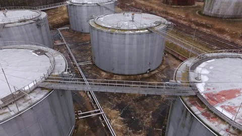 Drone Tilt Down Over Strategic Fuel Storage Tanks in Saldus Latvia Complex Stock Footage 337969143