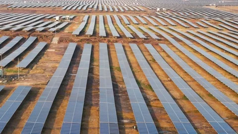 Drone Tilt Up Over Massive Solar Farm Revealing Endless Photovoltaic Panels Stock Footage 339186960