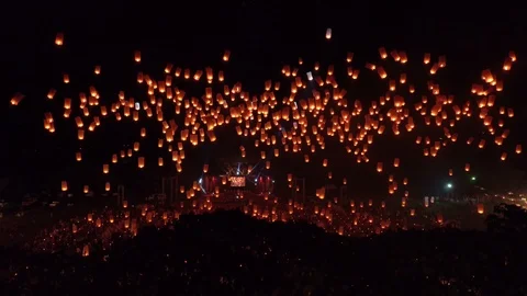 Drone tilt up sky lantern thousand lanterns 4k 60fps Stock Footage