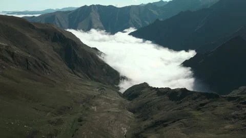 Drone tilt on a valley covered with clouds Stock Footage 170621838