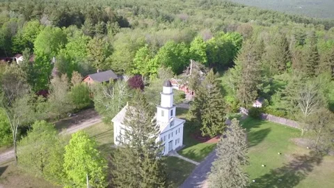 A Drone Tilts Down To A Church Then Pans Right Stock Footage 329770823