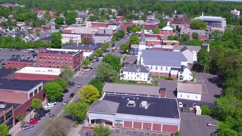 A Drone Tilts Down At Greenfield, Massachusetts Then Slowly Rises Stock Footage 329770794