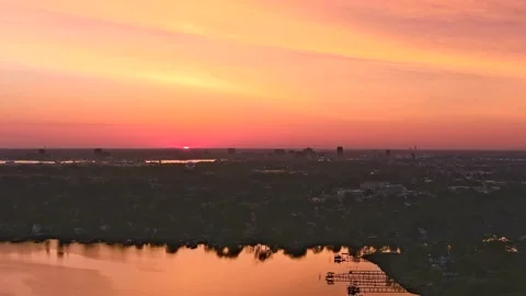 Drone time lapse of sunrise over Portsmouth with Norfolk in the background Stock Footage 152966638