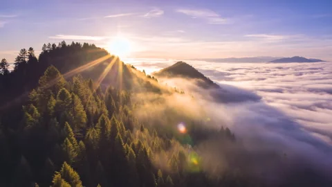 Drone Time Lapse of Sunrise Over Misty Mountain Forest Stock Footage 312112114