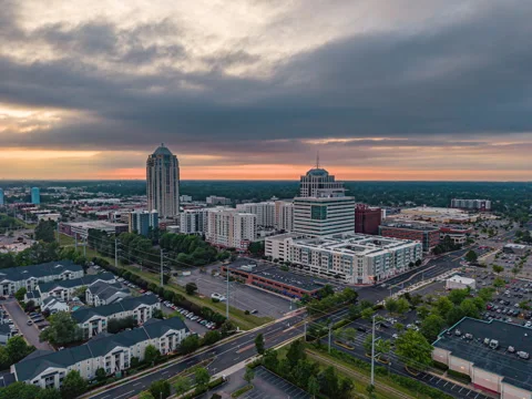 Drone Timelapse Approach to Town Center of Virginia Beach at Sunset Stock Footage 335646595