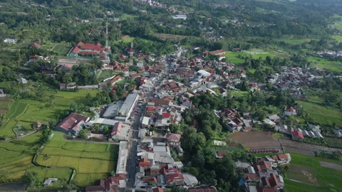This drone timelapse captures an aerial view of a densely populated residential Stock Footage 303473191