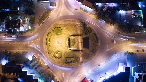 Drone timelapse of a circular intersection at night with long exposure Stock Footage