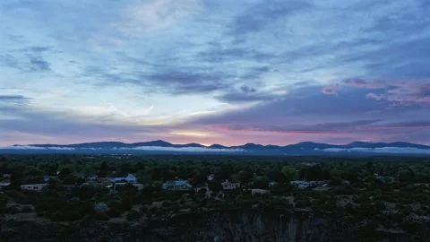 Drone Timelapse Flight Toward a Southwest Neighborhood from Canyon Edge Stock Footage 336958203