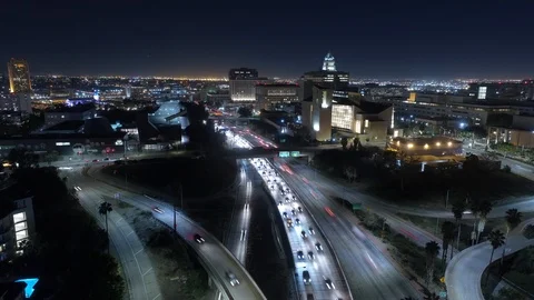 Drone timelapse hyperlapse rising above traffic in Downtown Los Angeles Stock Footage 85961071