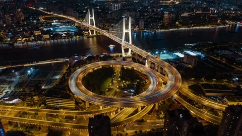 Drone Timelapse of Nanpu Bridge Traffic and City Lights at Night Stock Footage 318638003