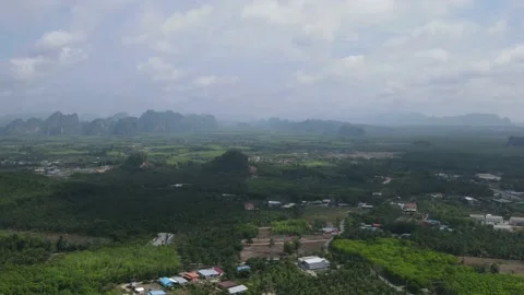 Drone timelapse over the field - clouds moving fast Stock Footage 194385702