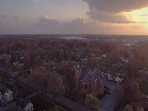 Drone Timelapse Over Small Mid West Town with Church During Sunset Stock Footage 81313234