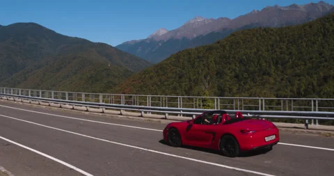 Drone Top Down Red Car Following Road Path Aerial Stock Footage 160277279