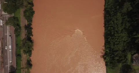 Drone top-down shot of Blumenau city and Itajaí-Açu River, SC Stock Footage 317736105