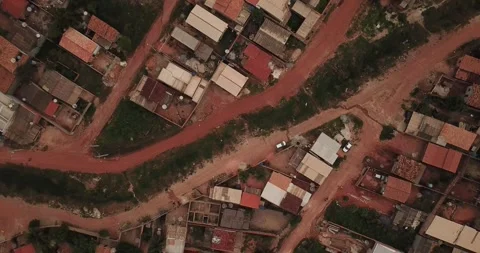 Drone top-down shot to a dirty puddle in a poor neighborhood, Xinguara, Pará Stock Footage 317734484