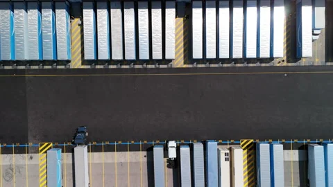 Drone Top down view of an Amazon logistics and distribution facility with Stockbeeldmateriaal 346790945