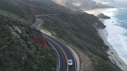 Drone top-down view of cars driving on the Pacific Coast Highway near Big Stock Footage 159594516