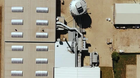 Drone Top Down View of Industrial Factory Roof and Grain Silo Video stock 337969073