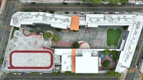 Drone top-down view of modern school in Los Angeles. playground, sports ground Stock Footage 223740921