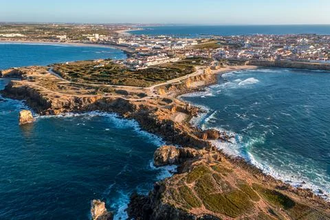 Drone top down view of rocky peninsula and town of Peniche, Portugal Stock Photos