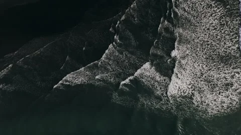 Drone top down view of waves at beach front new zealand Stock Footage 311310481