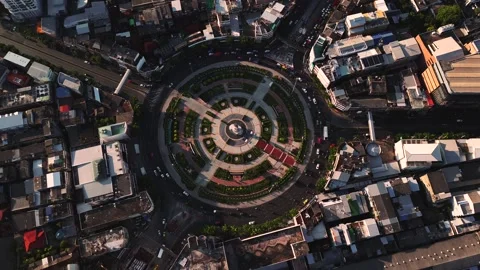 Drone top-down view of Wongwian Yai traffic circle in Thon Buri district Stock Footage 309626662